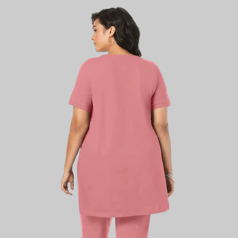 Desert Rose Two Pocket Soft Knit Tunic with short sleeves, scoop neckline, and two front pockets, designed for comfort and style in soft, breathable fabric.