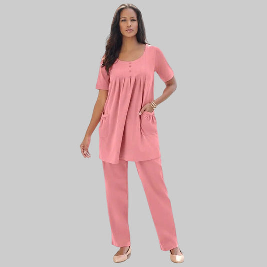 Desert Rose Two Pocket Soft Knit Tunic with short sleeves, scoop neckline, and two front pockets, designed for comfort and style in soft, breathable fabric.