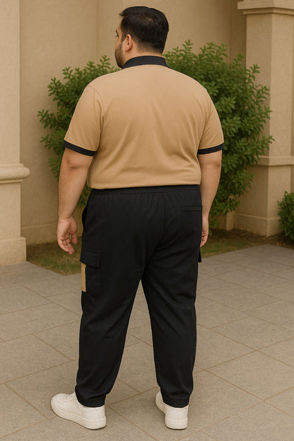 Plus-size Pakistani man wearing a tan and black cargo tracksuit, featuring a polo jersey top and terry pants with side pockets