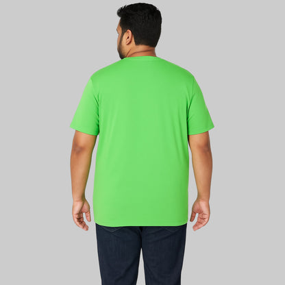 Plus-size Pakistani male model wearing Electric Green crewneck T-shirt with pocket on a light-gray background, relaxed fit casual wear.