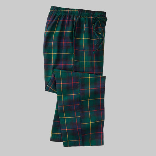 Emerald yellow plaid flannel pajama pants with elastic waistband, drawstring, and side pockets, made from soft brushed cotton fabric.