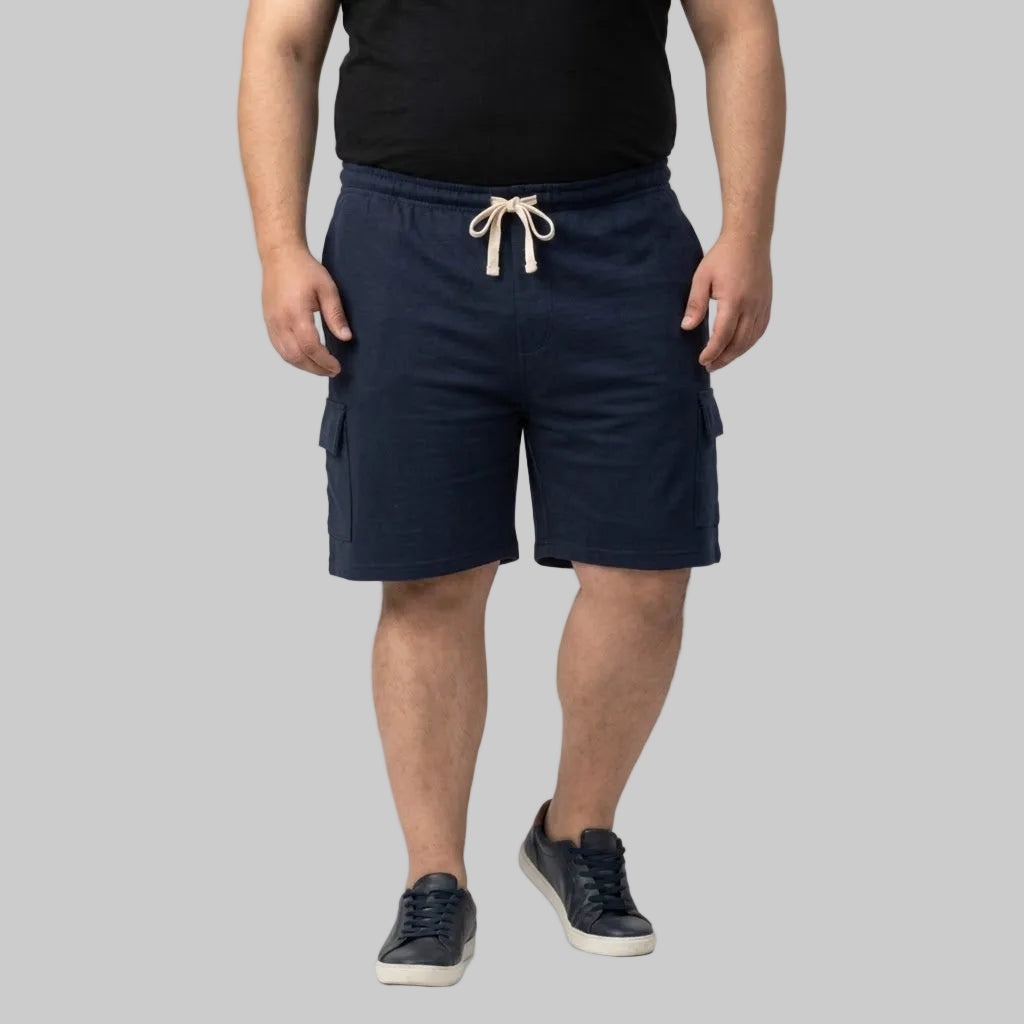 Essential Navy Terry Cargo Shorts made from soft terry fabric with cargo pockets and an elastic drawstring waistband for comfortable everyday wear.