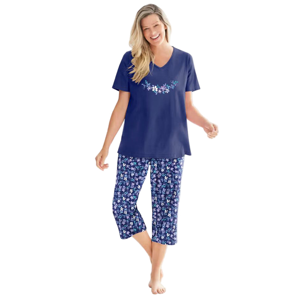 Women’s Pool Blue Cosmic Dreams Plus Size Capri Pajama Set with short-sleeve graphic tee and elastic waist capri bottoms, made from breathable cotton.