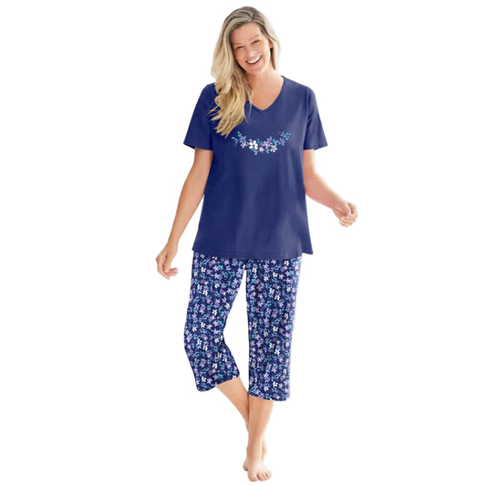 Women’s Pool Blue Cosmic Dreams Plus Size Capri Pajama Set with short-sleeve graphic tee and elastic waist capri bottoms, made from breathable cotton.
