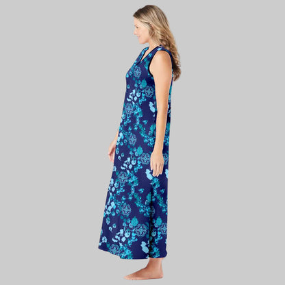 Plus-size woman wearing an evening blue sleeveless V-neck lounger with peony floral print, side pockets, and side slits on a white background.