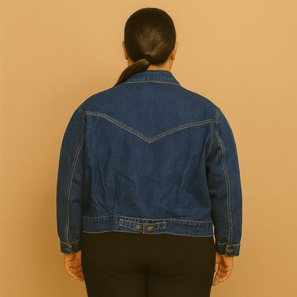 Plus-size woman wearing a true indigo western jean jacket with W-stitch chest pockets