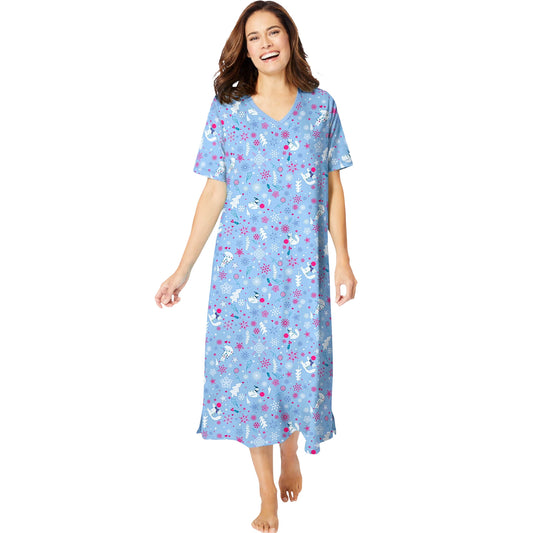 Woman wearing light blue floral printed long sleepshirt with V-neck