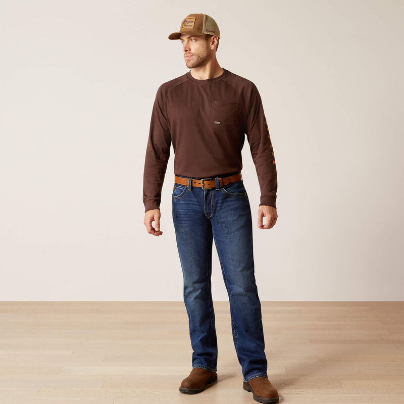 Plus-size male model wearing Galveston Relaxed Boot Cut Jeans in dark denim, showing relaxed fit, classic boot-cut leg opening, and durable workwear details.