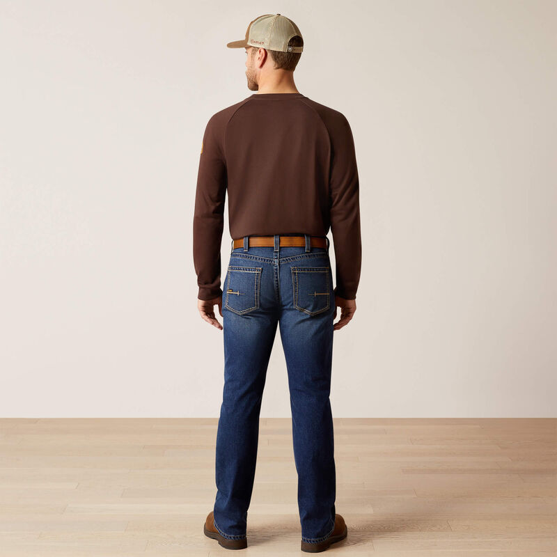 Plus-size male model wearing Galveston Relaxed Boot Cut Jeans in dark denim, showing relaxed fit, classic boot-cut leg opening, and durable workwear details.