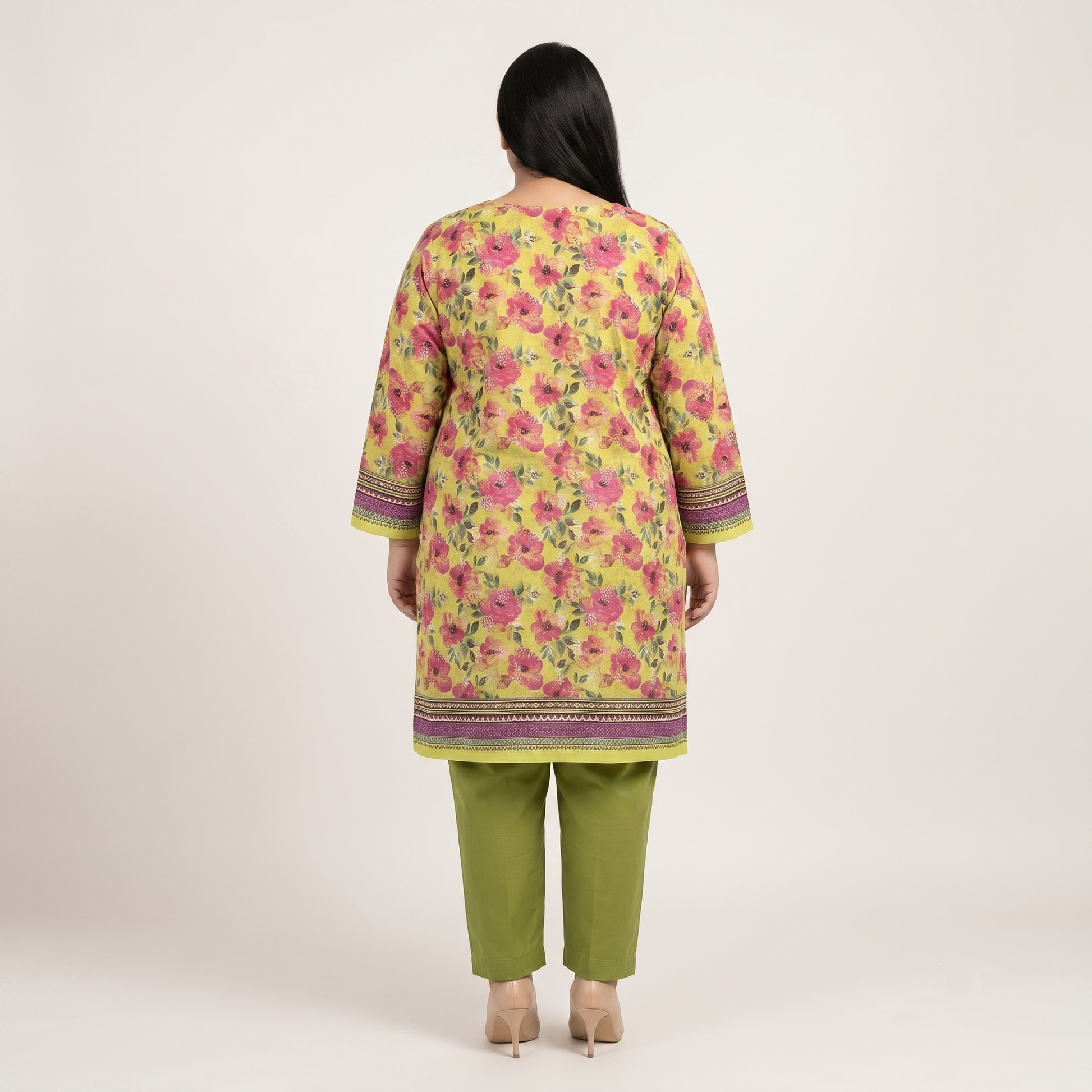 Woman wearing a Golden Meadow Floral 3-Piece Suit featuring a golden floral printed shirt, olive green straight-fit trousers, and a contrasting floral printed dupatta with decorative borders.