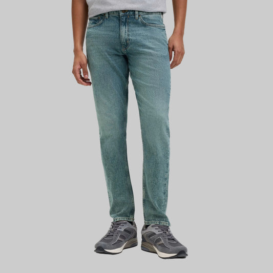 Green tint slim-fit denim jeans with stretch, mid-rise waist, washed finish, and classic five-pocket design for comfortable everyday casual wear.