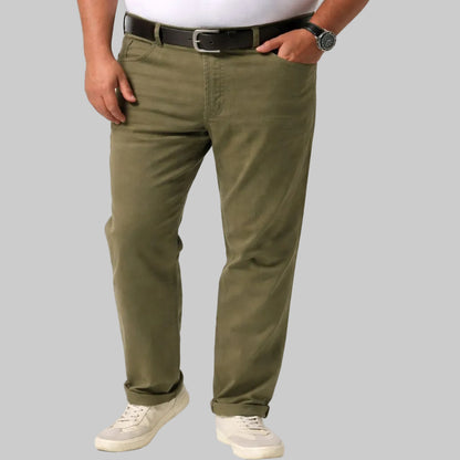 Green Haven Everyday Pants in a deep green shade, featuring a straight relaxed fit, soft comfortable fabric, classic waistband with button and zip closure, functional side pockets, and a clean everyday casual look