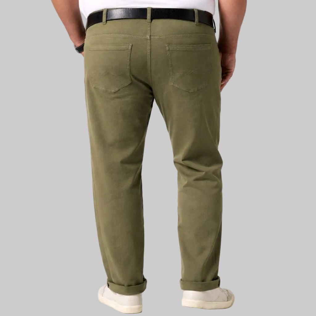 Green Haven Everyday Pants in a deep green shade, featuring a straight relaxed fit, soft comfortable fabric, classic waistband with button and zip closure, functional side pockets, and a clean everyday casual look