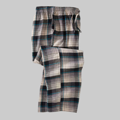 Grey blue plaid flannel pajama pants with elastic waistband, drawstring, and side pockets — soft 100% cotton lounge wear.