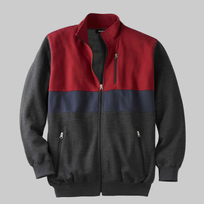 Heather charcoal colorblock full-zip fleece jacket with rib-knit trim, front zipper pockets, and soft inner lining — casual cool-weather outerwear.