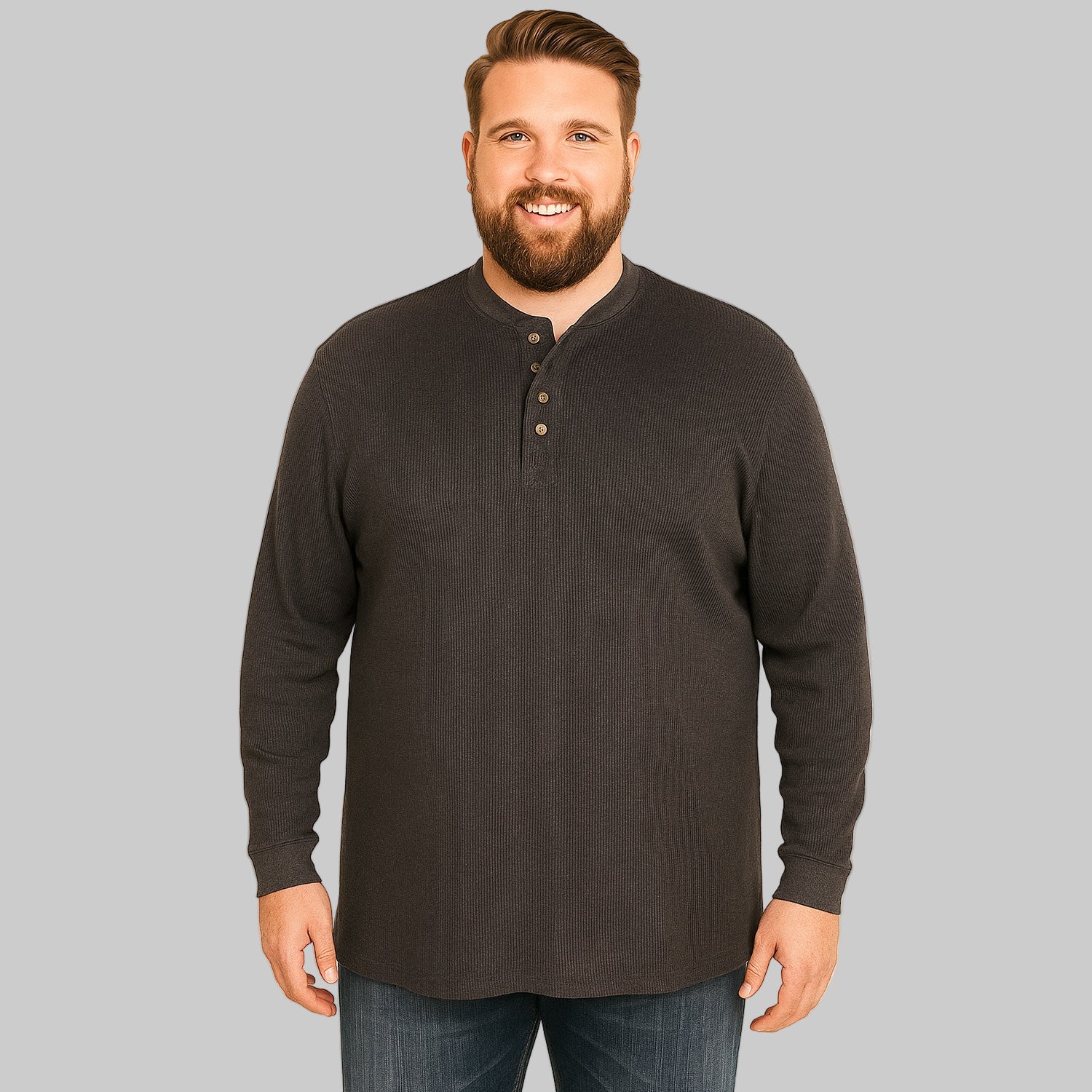 Model wearing heather charcoal waffle-knit thermal Henley tee with five-button placket and ribbed cuffs on plain white background.