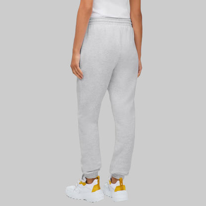 Plus-size woman wearing Heather Grey Fleece Jogger Sweatpants with drawstring waist