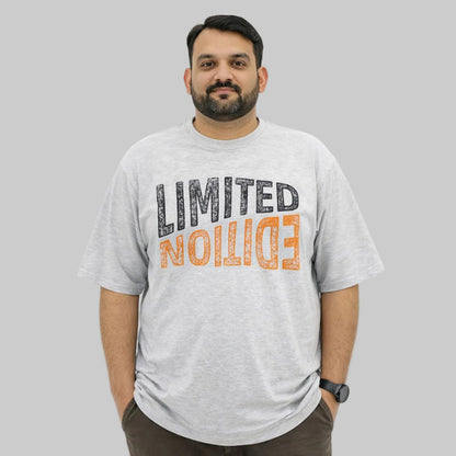 Heather grey limited edition big size crewneck t-shirt worn by a plus-size Pakistani male model in a relaxed fit, front view, studio background