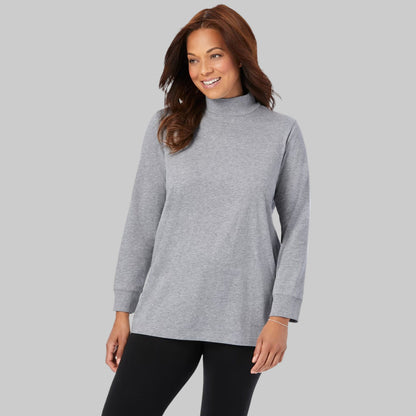 Plus-size woman wearing a heather grey long-sleeve mockneck tee with a relaxed fit, displayed on a white studio background.
