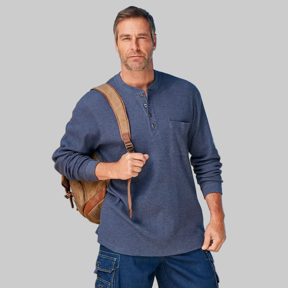 Heather navy longer-length thermal Henley shirt with 4-button placket, chest pocket, and relaxed fit for cold-weather comfort.