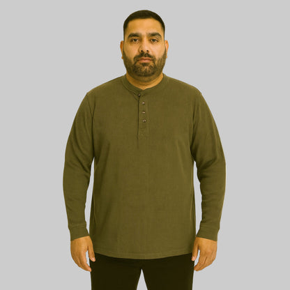 Plus-size Pakistani male model wearing heather olive waffle-knit thermal Henley shirt on a clean studio background, long sleeves, relaxed fit.