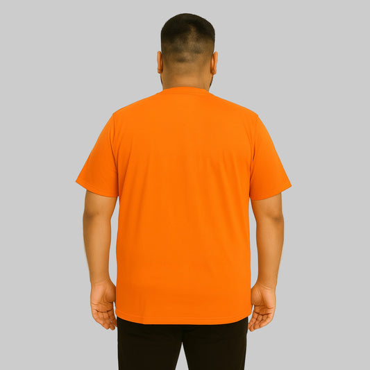 Plus-size Pakistani male model wearing heather orange crewneck pocket T-shirt on a clean studio background.