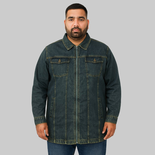 Plus-size male model wearing an indigo full-zip denim jacket with chest flap pockets and side pockets, front view on a clean studio background.