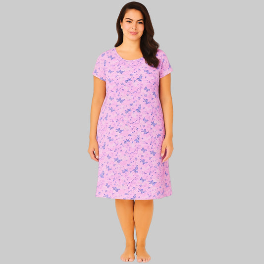 Plus-size woman wearing a lavender short sleeve cotton sleepshirt with relaxed fit, shown on a clean white studio background.