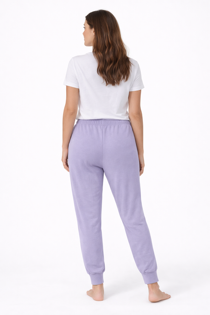 Women’s lavender cloud jersey jogger pajama pants with elastic waistband, drawstring and ribbed ankle cuffs laid flat on a white background.