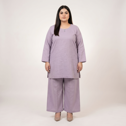Front view of a woman wearing a Lavender Mist Co-Ord Set featuring a solid lavender textured tunic with an embellished neckline and matching wide-leg trousers.