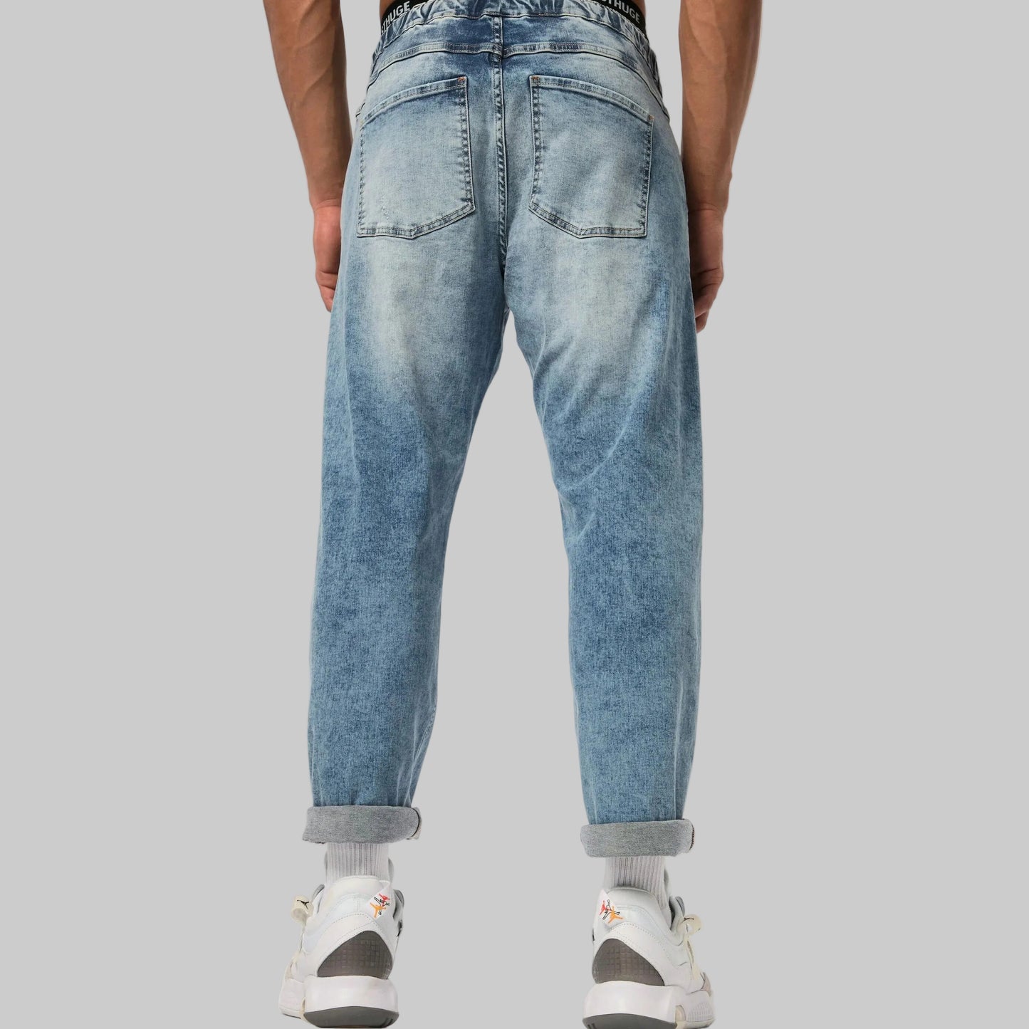 Light blue straight leg denim jeans with elasticated waist, stretch fabric, side and back pockets, and a relaxed everyday fit.