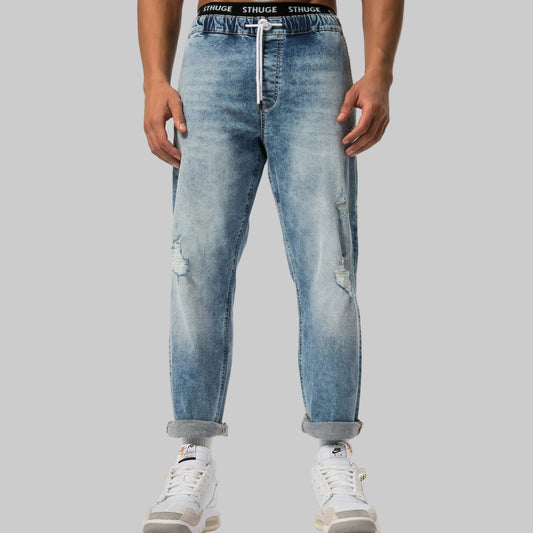 Light blue straight leg denim jeans with elasticated waist, stretch fabric, side and back pockets, and a relaxed everyday fit.