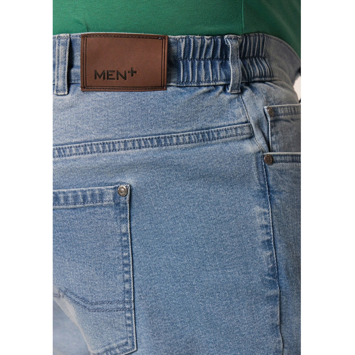 Light denim straight leg jeans with cotton stretch fabric, normal rise, concealed fly, and side and back pockets.