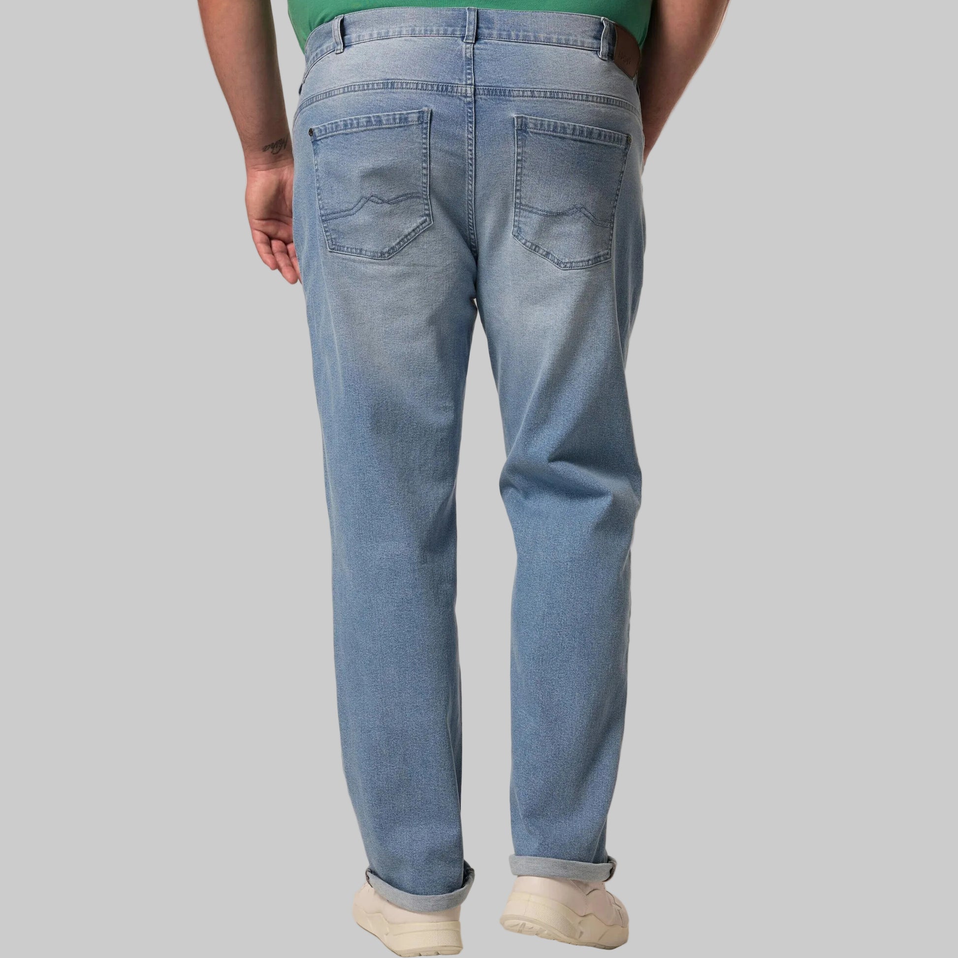 Light denim straight leg jeans with cotton stretch fabric, normal rise, concealed fly, and side and back pockets.