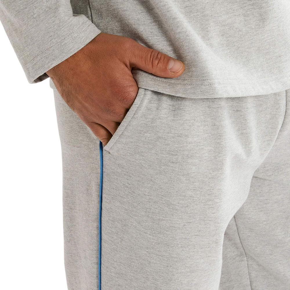 Light grey men's fleece tracksuit with half-zip collar, blue contrast details, and jogger-style bottoms.