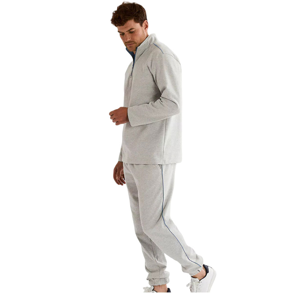 Light grey men's fleece tracksuit with half-zip collar, blue contrast details, and jogger-style bottoms.