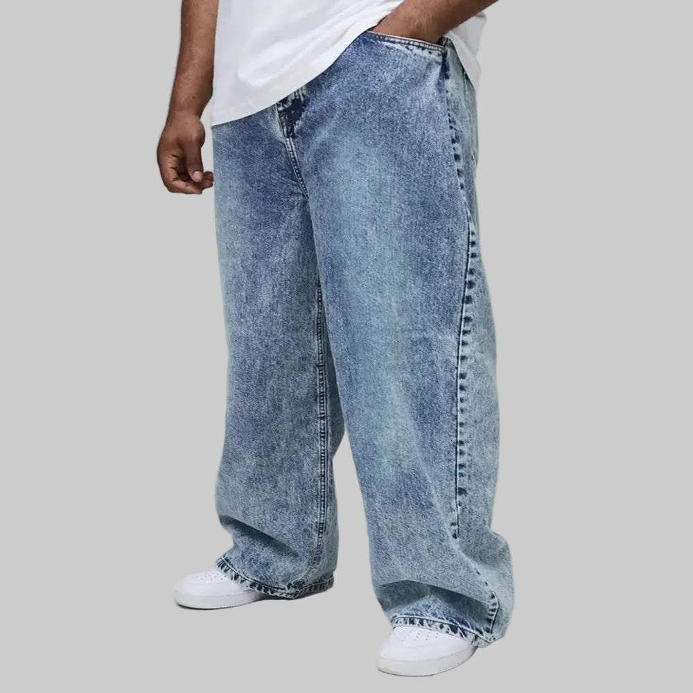 Light blue wash wide-leg denim jeans for men with relaxed fit and vintage washed finish.