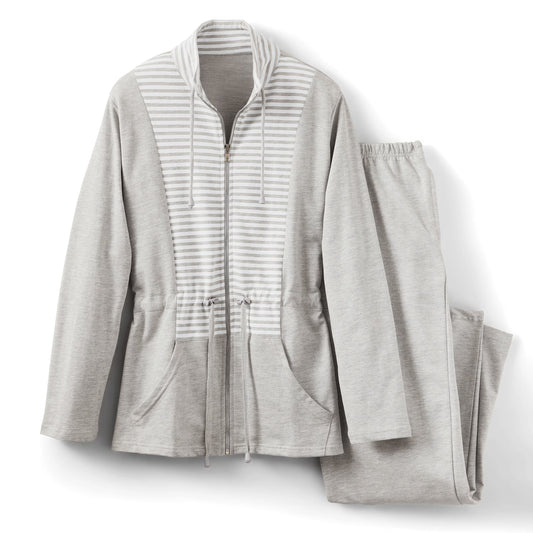 Plus-size Pakistani woman wearing light grey striped lounge set with full-zip top and drawstring pants