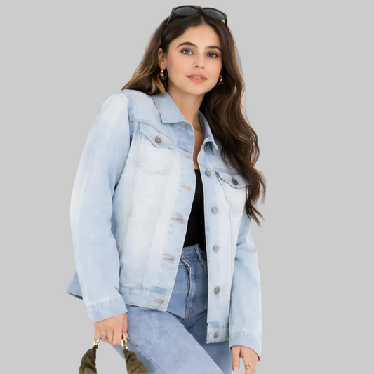 Light blue denim jacket with oversized boyfriend fit, button fastening, and two chest pockets made from 100% cotton.