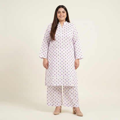 Woman wearing a Lilac kurta with purple floral patterns on a beige background