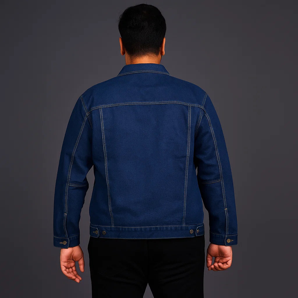Man wearing a classic indigo button-up denim jacket with flap chest pockets and straight fit

