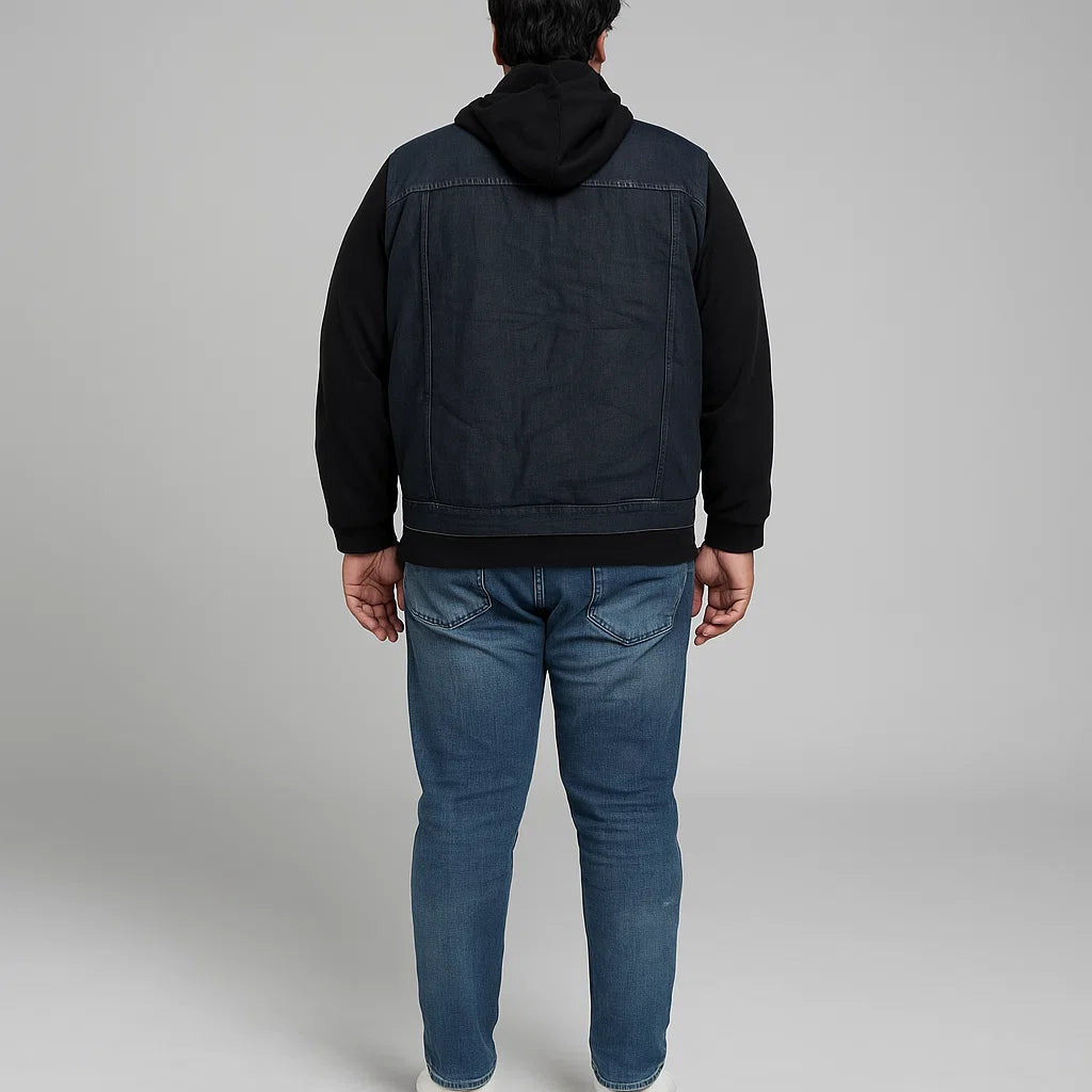 Man wearing a black denim hoodie jacket with button closure and fleece sleeves