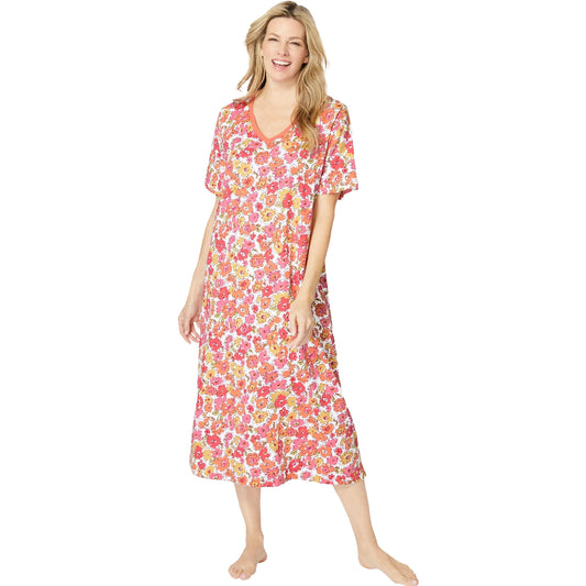 Woman wearing long melon floral printed sleepshirt with short sleeves