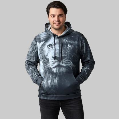 Plus-size male and female models wearing black “Midnight Strength” graphic hoodies with front print, styled in a cozy modern studio setup.