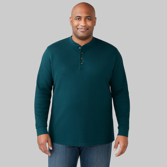 Model wearing midnight teal waffle-knit thermal Henley tee with ribbed cuffs and five-button placket against a plain white background.