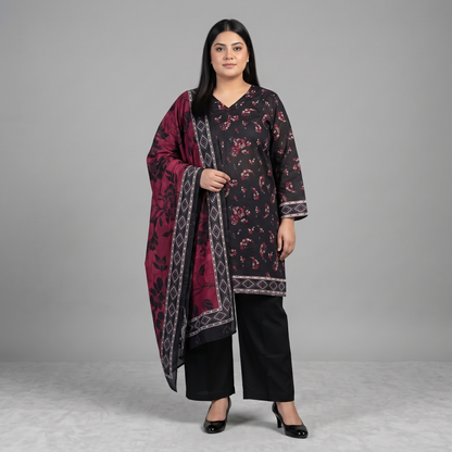 Woman wearing a Midnight Rose Printed 3-Piece Suit featuring a black floral printed shirt, solid black trousers, and a maroon floral printed dupatta with decorative border detailing.