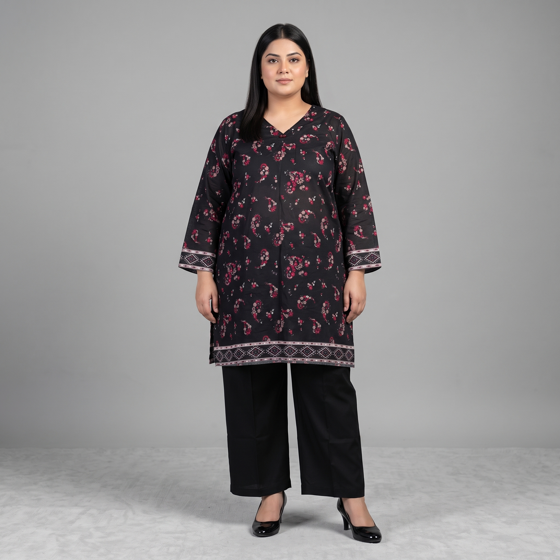 Woman wearing a Midnight Rose Printed 3-Piece Suit featuring a black floral printed shirt, solid black trousers, and a maroon floral printed dupatta with decorative border detailing.