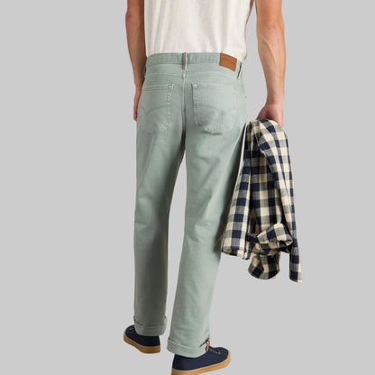 Mint tapered fit jeans with cotton stretch fabric, normal rise, belt loops, and side and back pockets.