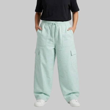 Mint Breeze Cargo Baggy Trousers crafted from premium 98% cotton, 2% elastane twill dyed fabric with a relaxed baggy fit, elastic waistband, and functional cargo pockets.
