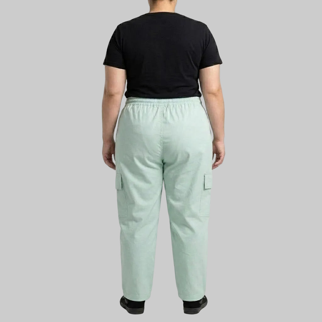 Mint Breeze Cargo Baggy Trousers crafted from premium 98% cotton, 2% elastane twill dyed fabric with a relaxed baggy fit, elastic waistband, and functional cargo pockets.